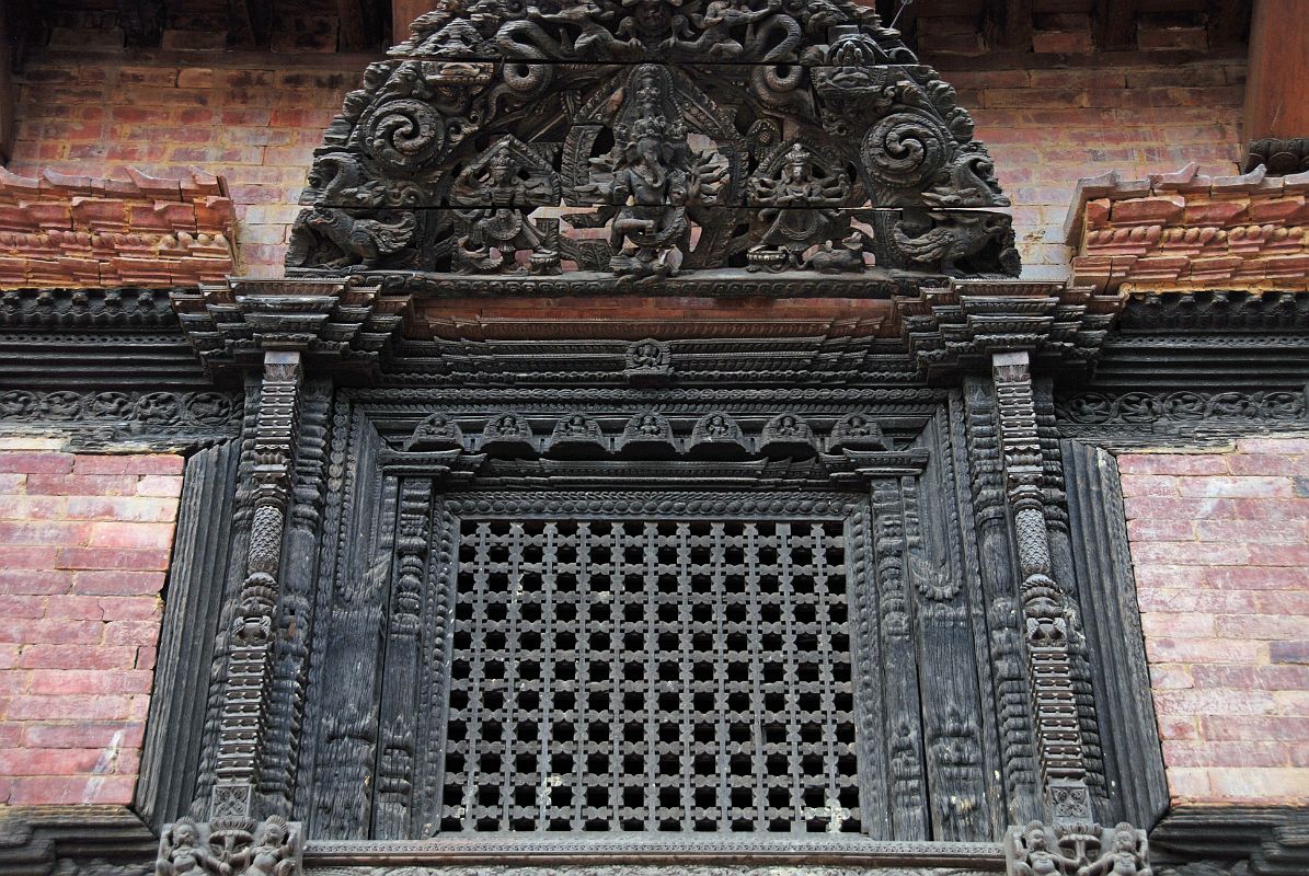 Kathmandu Bhaktapur 03-2 Bhaktapur Durbar Square Palace Of 55 Windows Close Up Here is a close up of one of the 55 beautifully carved windows in the Palace of 55 Windows in Bhaktapur�s Durbar Square.